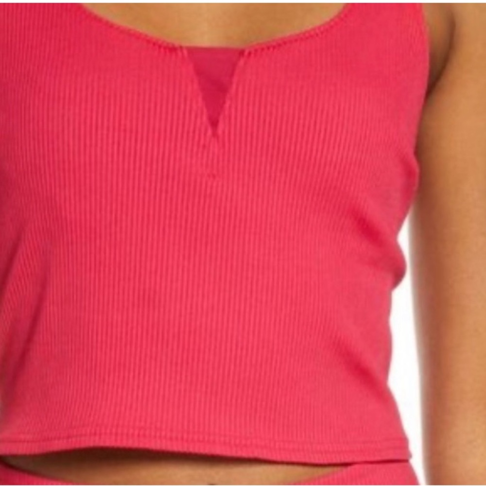NWT Free People Movement Settle it on the court. Size M. Color Dragonfruit.